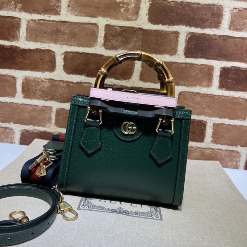 G*u*i top handle bags